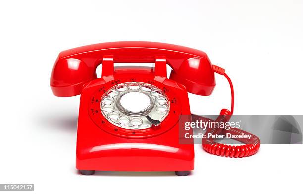 red telephone - old fashioned telephone stock pictures, royalty-free photos & images