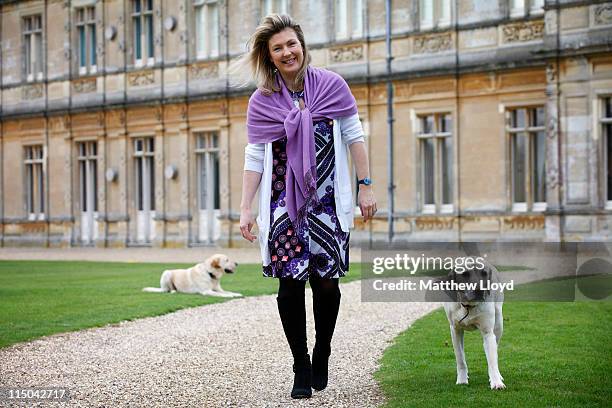 Lady Carnarvon walks her dogs in the grounds of Highclere Castle on March 15, 2011 in Newbury, England. Highclere Castle has been the ancestral home...