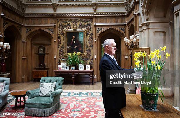 Colin the butler tends to some flowers in Highclere Castle on March 15, 2011 in Newbury, England. Highclere Castle has been the ancestral home of the...