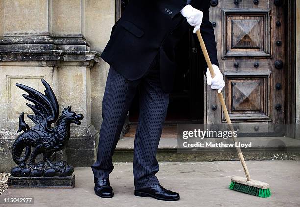 Colin the butler sweeps up outside Highclere Castle on March 15, 2011 in Newbury, England. Highclere Castle has been the ancestral home of the...