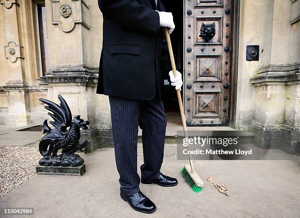 Colin the butler sweeps up outside Highclere Castle on March 15, 2011 in Newbury, England. Highclere Castle has been the ancestral home of the...