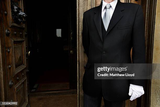 Colin the butler poses outside Highclere Castle on March 15, 2011 in Newbury, England. Highclere Castle has been the ancestral home of the Carnarvon...