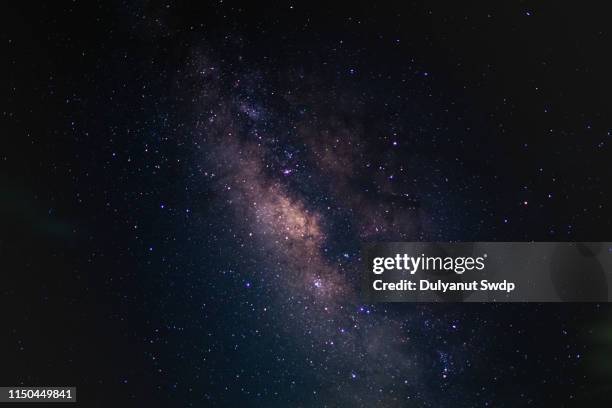 milky way in the sky in thailand. - stars v heat stock pictures, royalty-free photos & images