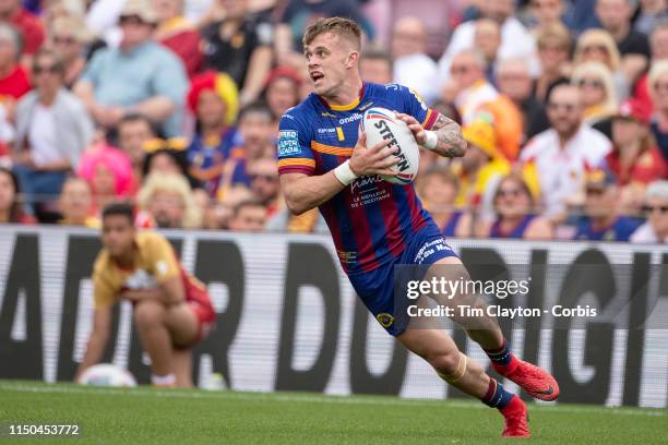 May 18: Lewis Tierney of Catalans Dragons in action during the Catalans Dragons V Wigan Warriors, Betfred Super League regular season match at Nou...