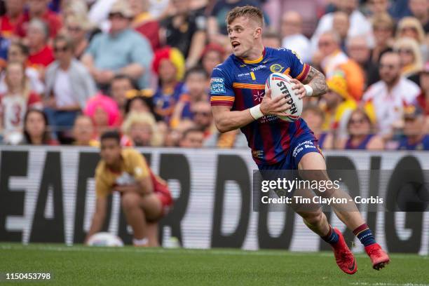 May 18: Lewis Tierney of Catalans Dragons in action during the Catalans Dragons V Wigan Warriors, Betfred Super League regular season match at Nou...