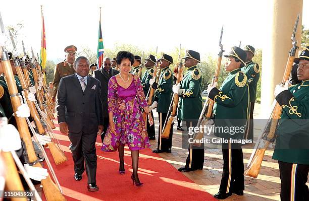 South Africa's Minister of Defence Lindiwe Sisulu and Mozambique's Minister of Defence Filipe Jacinto Nyusi attend the commencement of negotions...