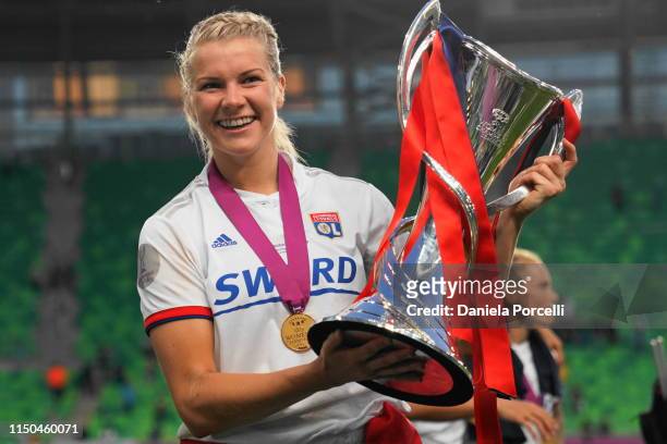 Ada Hegerberg of Olympique Lyonnais posing with the trophy during the UEFA Women's Champions League Final between Olympique Lyonnais and FC Barcelona...