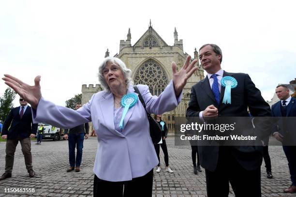 Leader of the Brexit Party Nigel Farage and Ann Widdecombe outside Exeter Cathedral during their tour of the town centre on May 20, 2019 in Exeter,...