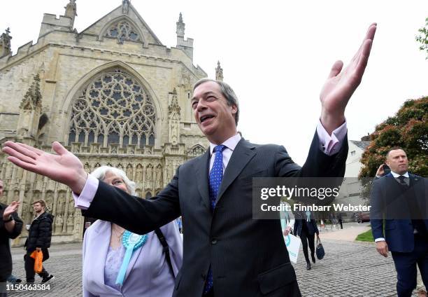 Leader of the Brexit Party Nigel Farage and Ann Widdecombe outside Exeter Cathedral during their tour of the town centre on May 20, 2019 in Exeter,...