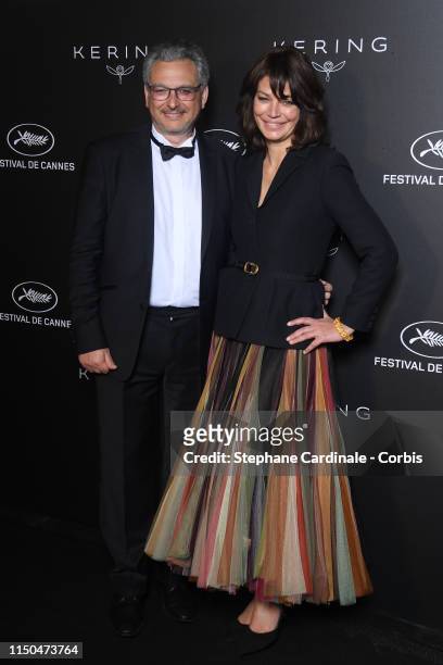 Victor Hadida and Marianne Denicourt at Place de la Castre on May 19, 2019 in Cannes, France.
