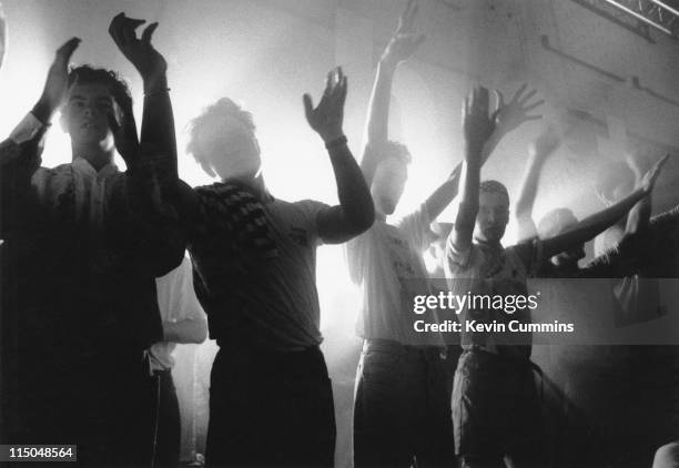 People on the dancefloor at The Hacienda's night club in Manchester, circa 1990.