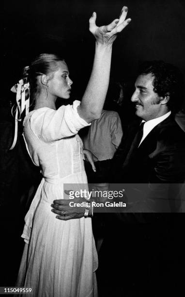 Margaux Hemingway and Errol Wetson attend the party for Seals and Croft on May 12, 1975 at Gallagher's Restaurant in New York City.