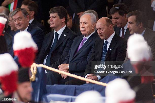 Slovenian President Danilo Turk , Israeli President Shimon Peres and Romanian President Traian Basescu attend the military parade to mark the...