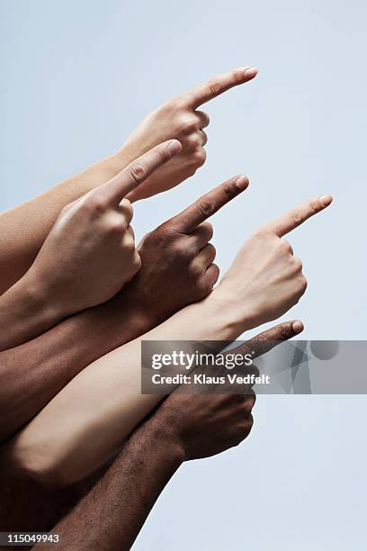 5 pointing fingers of multiple ethnicities - dedo fotografías e imágenes de stock