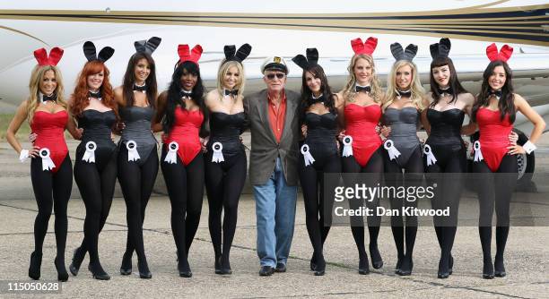 Playboy founder Hugh Hefner arrives at Stansted Airport on June 2, 2011 in Stansted, England. The photograph is a recreation of a picture originally...