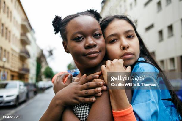 affectionate lesbian couple - respect stock pictures, royalty-free photos & images