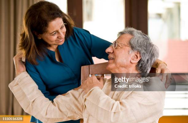 happy senior couple at home - indian elderly couple stock pictures, royalty-free photos & images