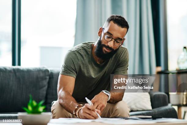 he knows exactly where his money goes - most handsome black men stock pictures, royalty-free photos & images