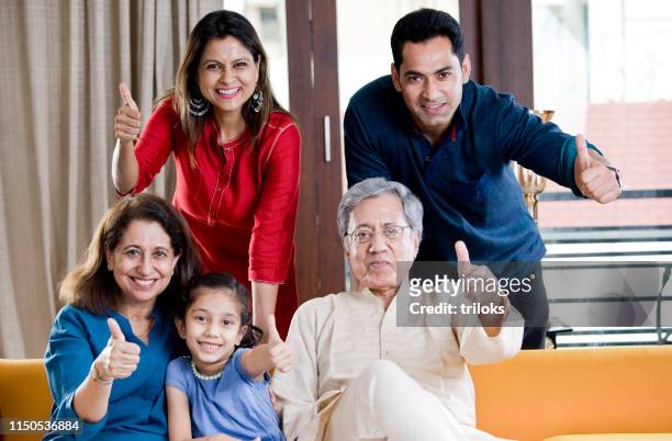 happy indian family - image stock pictures, royalty-free photos & images