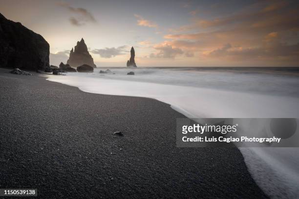reynisfjara black-sand beach - southern rock stock pictures, royalty-free photos & images