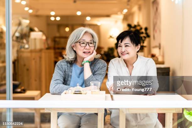 elderly asian women are drinking tea - hong kong grandmother stock pictures, royalty-free photos & images