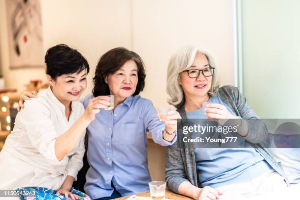 elderly asian women are drinking tea - taipei tea stock pictures, royalty-free photos & images