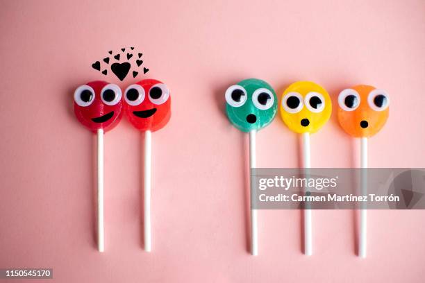 homosexual couple - wackelaugen stock-fotos und bilder