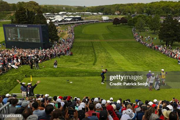 Brooks Koepka of the United States plays a shot from the first tee during the final round of the 2019 PGA Championship at the Bethpage Black course...