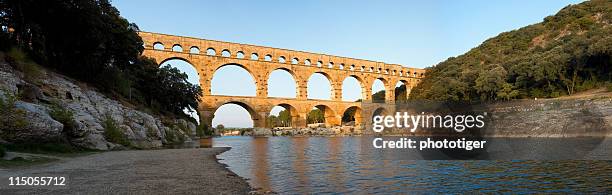 pont du gard - pont du gard aqueduct stock-fotos und bilder