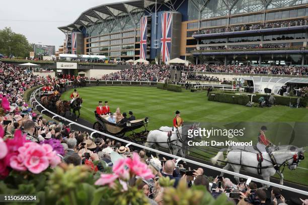 Queen Elizabeth II and Queen Maxima of the Netherlands arrive for the first day of races at Ascot Racecourse on June 18, 2019 in Ascot, England. The...