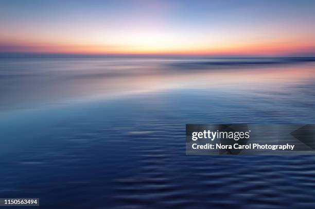 lon exposure beach sunset background - kota kinabalu beach stock pictures, royalty-free photos & images