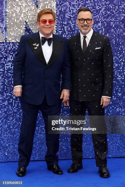 Executive producers Sir Elton John and David Furnish attend the "Rocketman" UK premiere at Odeon Luxe Leicester Square on May 20, 2019 in London,...