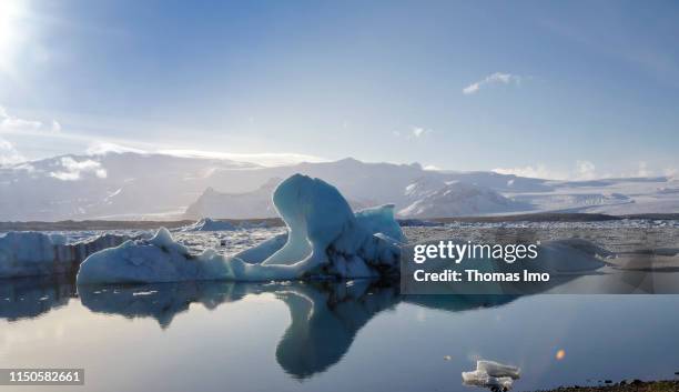 Small iceberg coming out of the water of the Joekulsarlon Glacier pictured on March 30, 2019 in Joekulsarlon , Iceland.