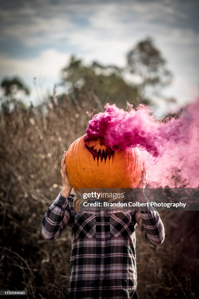 Hallowen themed pumpkin with smoke grenade