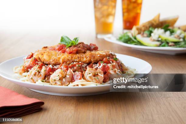 chicken and shrimp marsala - chicken parmesan spaghetti stock pictures, royalty-free photos & images
