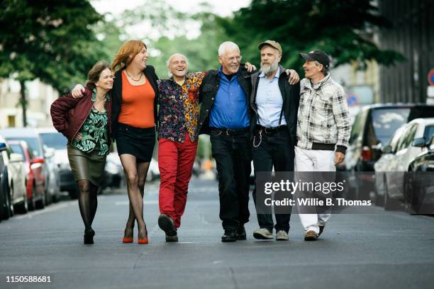 group of senior and middel age queer people - 50s skirt stock pictures, royalty-free photos & images