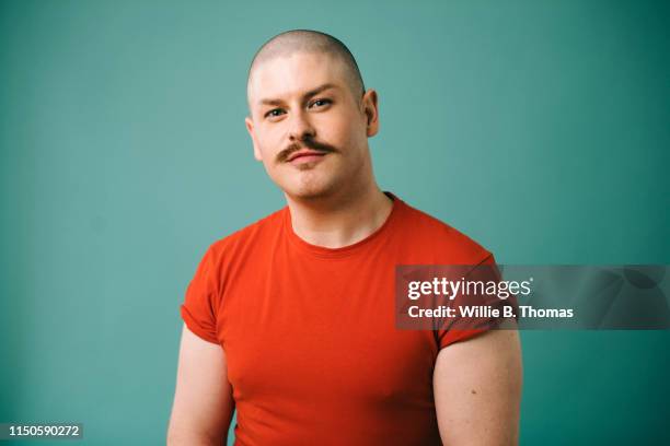 portraits of gay man - bigode imagens e fotografias de stock