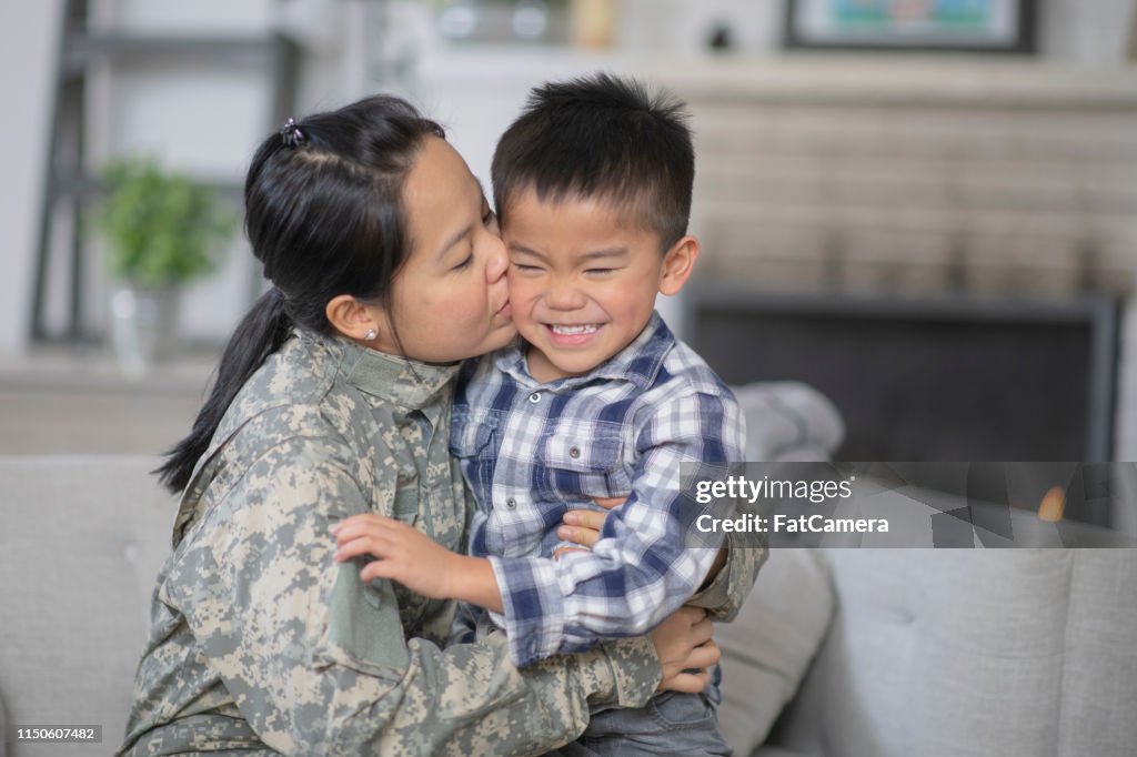 Military Mom Hugging Her Son