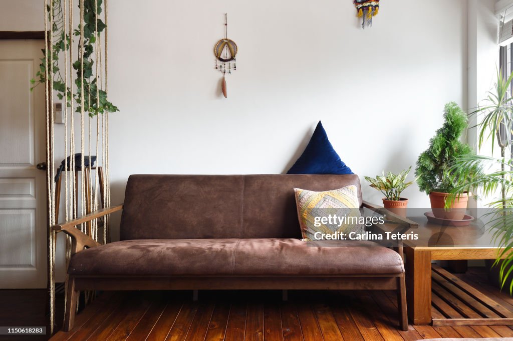 Sofa in a modern nature themed living room