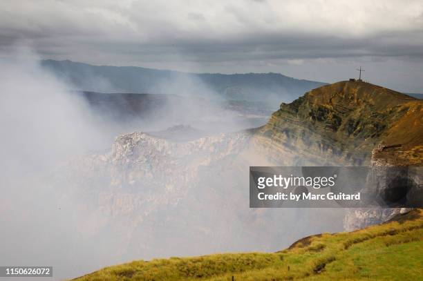 steam and volcanic crater, masaya, nicaragua - masaya volcano stock-fotos und bilder
