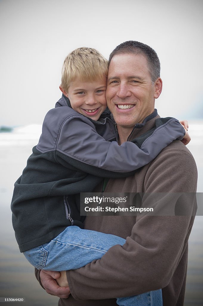 Father and son portrait at the beach