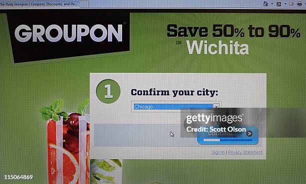 In this photo illustration, the Groupon logo is displayed on the company's website June 2, 2011 in Chicago, Illinois. Groupon announced today that it...