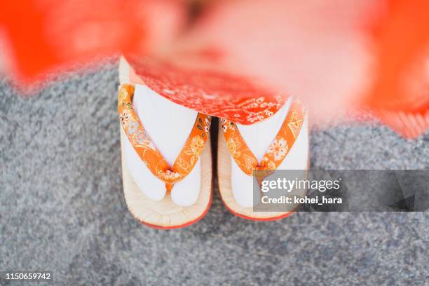 girl's legs wearing kimono and japanese sandals - shichi go san stock pictures, royalty-free photos & images