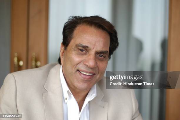 Bollywood actor Dharmendra poses during a photoshoot, on June 27, 2007 in New Delhi, India.
