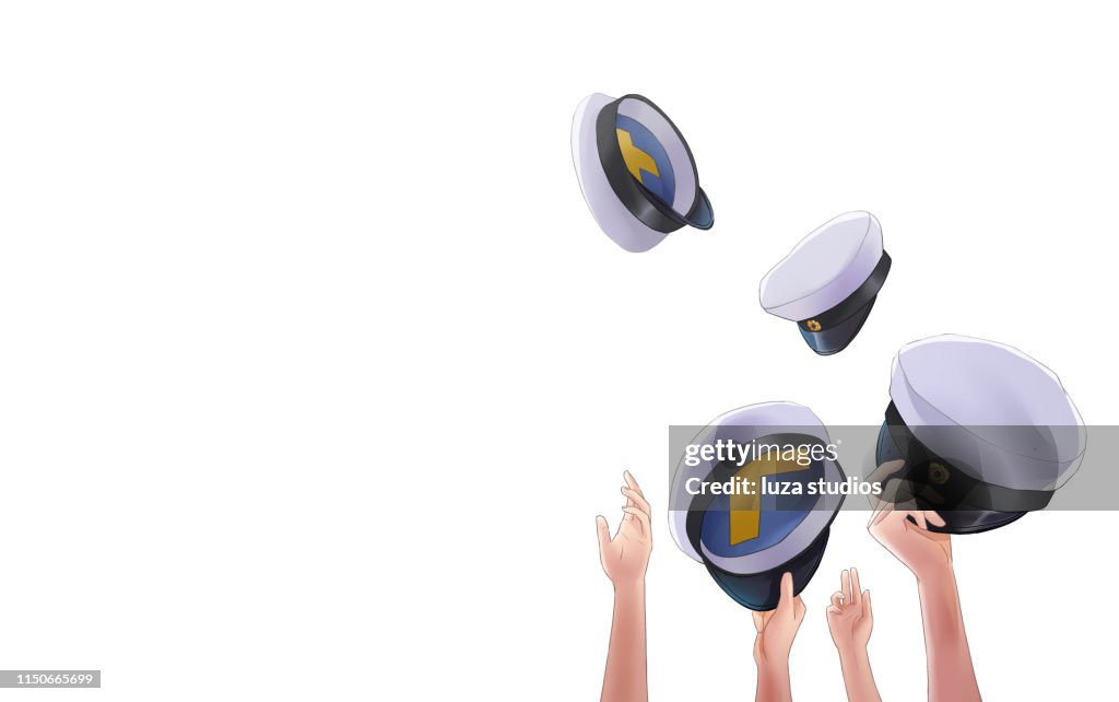 Swedish graduation hats being thrown up in the air