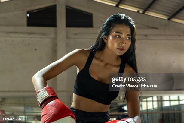 woman boxing workout in the gym. - gym fashion stock pictures, royalty-free photos & images