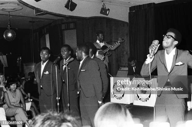 The Temptations perform on stage at The Trip club on Sunset Boulevard, Los Angeles, California, 9th August 1966.