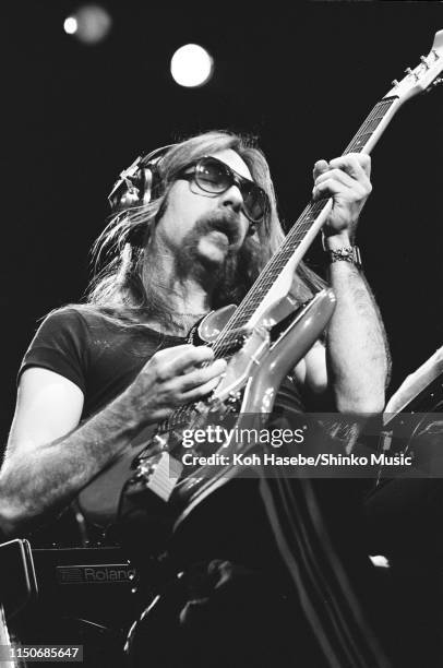 Jeff 'Skunk' Baxter of The Doobie Brothers performing on stage at Nippon Budokan, Tokyo, Japan, February 1979. He is playing a Burns guitar.
