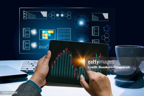 businessman using tablet device to check market data and economic growth graph chart. business strategy. digital marketing. - action plan photos et images de collection