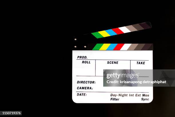 movie clapper board,movie production, - film reel table stock pictures, royalty-free photos & images
